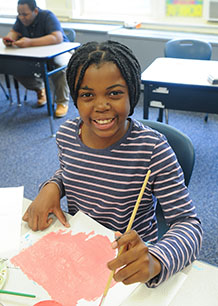 Female TTA middle school student working on art - private special education school NJ