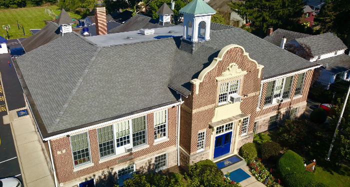 TTA School Building drone photo from above front of building